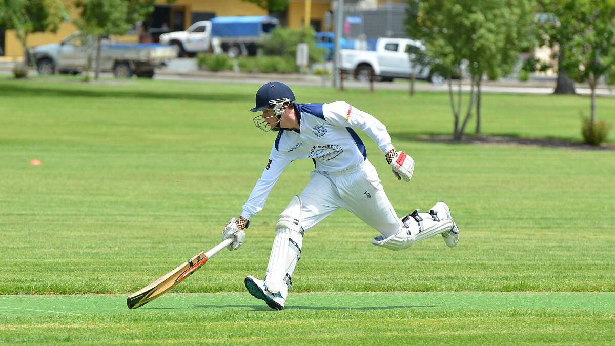 Bat slide: Nulla batsman Dan Baker completes a run for his side during their match against the United All Blacks last week. Photo: Penny Tamblyn 