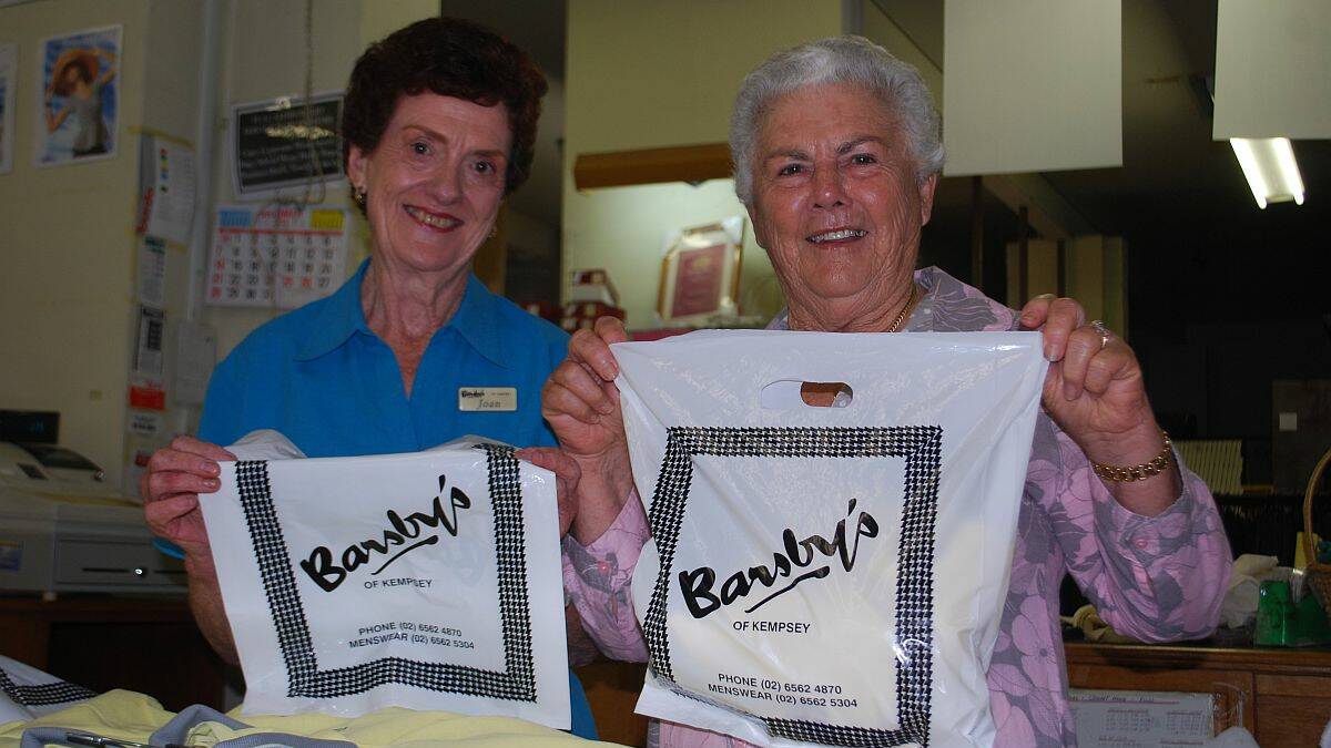 Many memories: Barsby's staff member Joan Fitzgerald (left) with long time customer Dianne Latham. Mrs Fitzgerald has been working in the store for 50 years, and Mrs Latham shopping there for 40 years. The store closed yesterday after 106 years of trading in Kempsey.