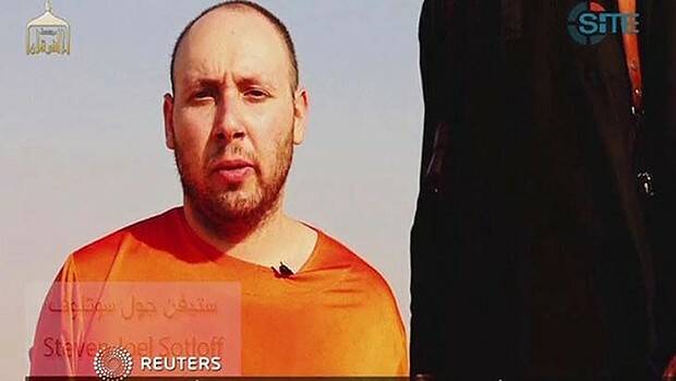 This image from video posted on the internet by Islamic State militants purports to show journalist Steven Sotloff before he was beheaded. Photo: Reuters