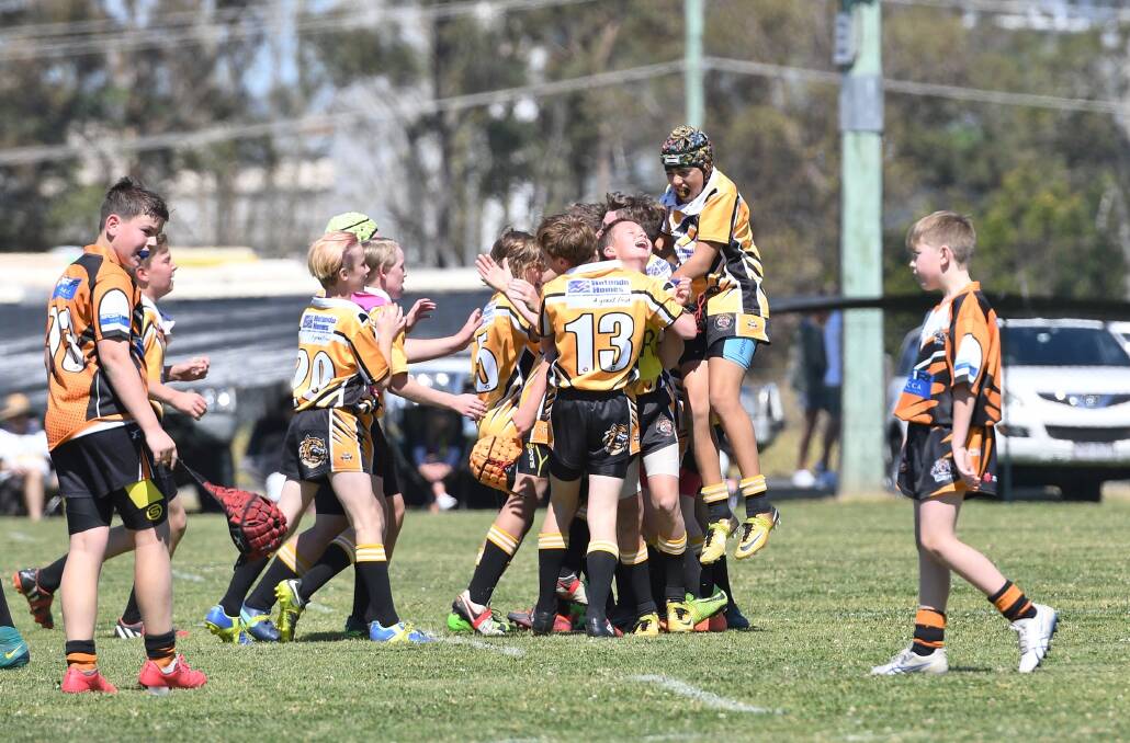 Pure joy: The Smithtown Tigers U12s side celebrates winning the grand final 26-6 over Bowraville on Saturday. Photo: Penny Tamblyn.