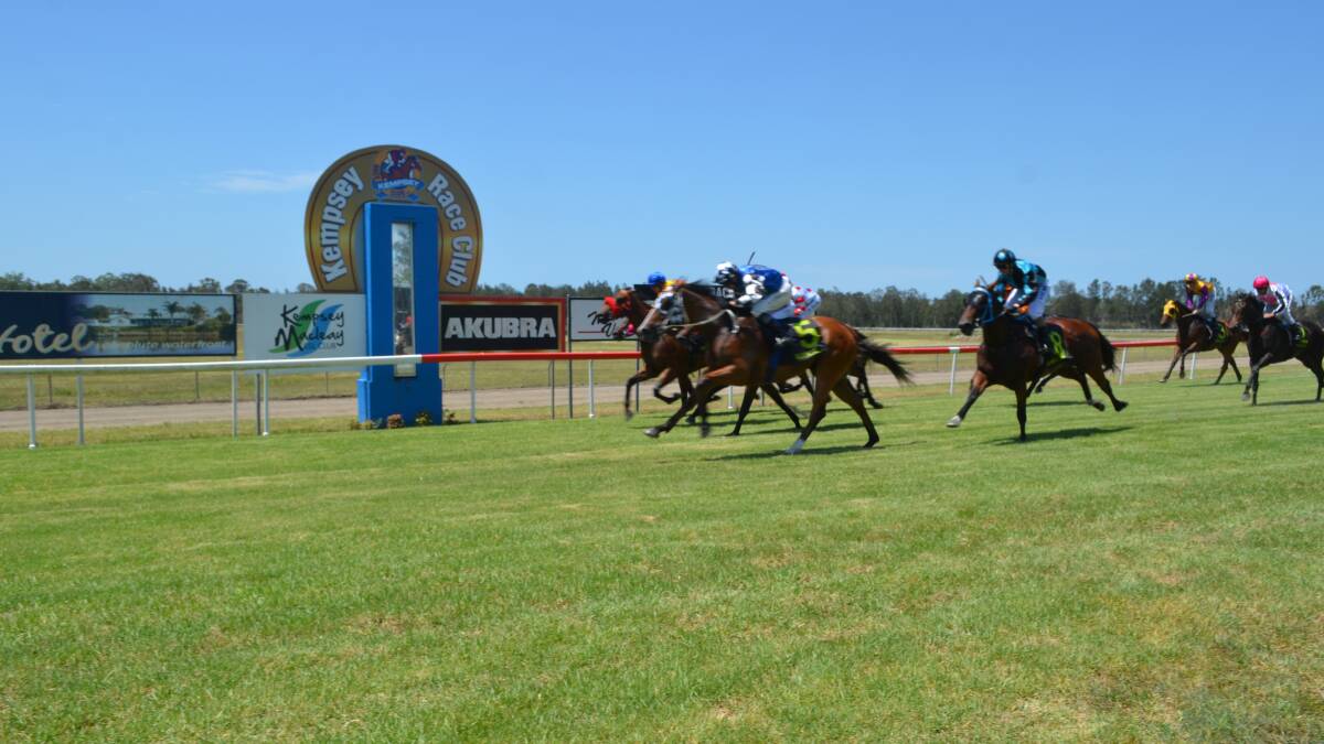 It was a close finish for the end of race one with punters cheering on number 5 earning the celebrations.