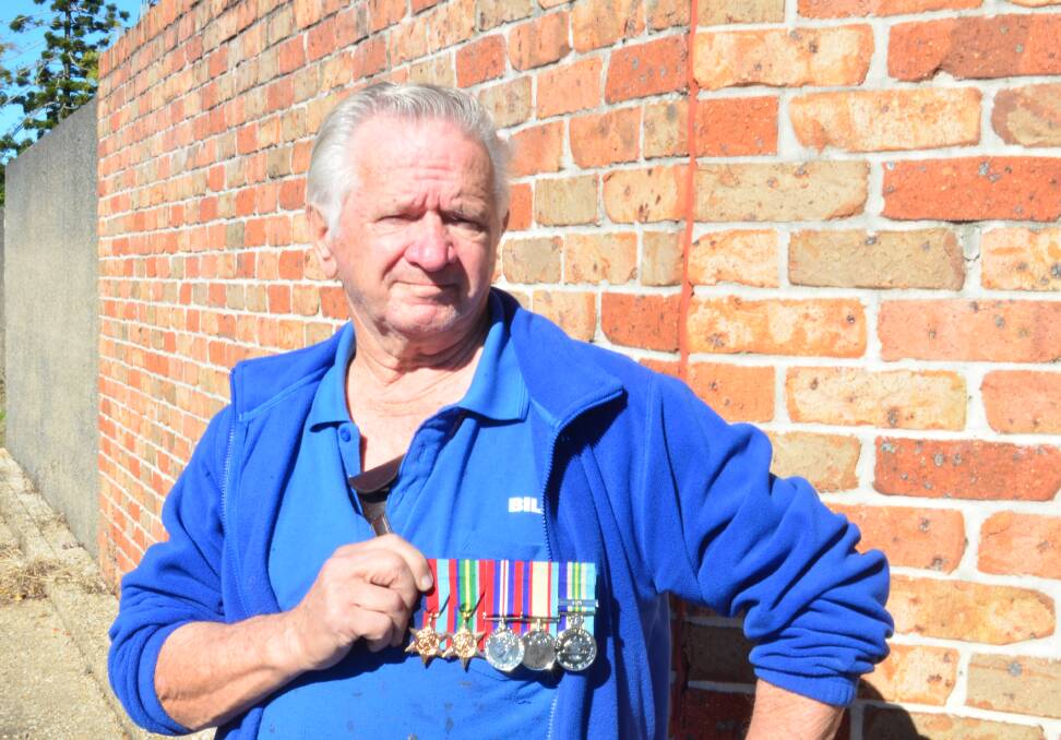 Relieved: Bill Holden was overcome by emotions after hearing his father's war medals had been returned. Photo: Callum McGregor.
