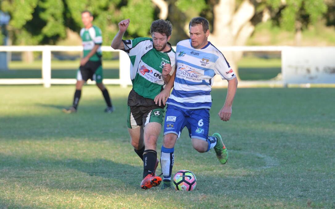 Depth to be tested: Macleay Valley Rangers first grade player Steven Morn steers the ball away from an opposition player. Photo: Penny Tamblyn.