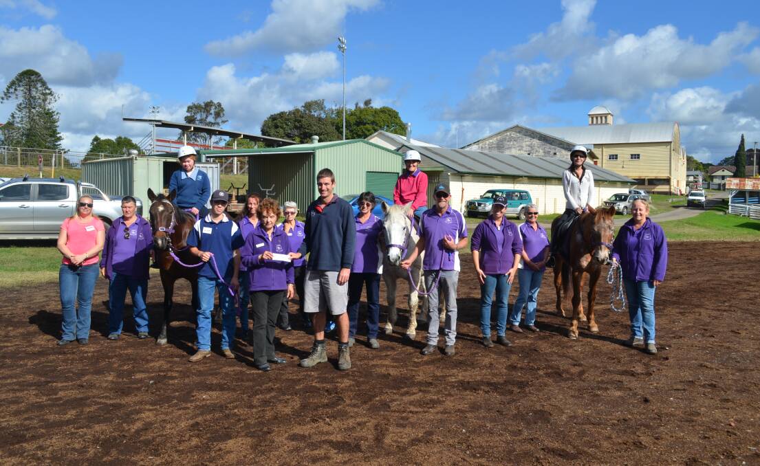 Donation: Macleay Valley Veterinary Services co-owner Mitch Edwards presented the Macleay Valley Riding for the Disabled with a $1,000 donation. Photo: Callum McGregor.