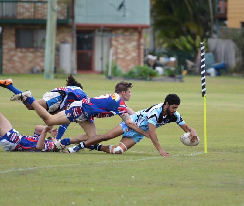 Crossing for a four-pointer: A South West Rocks Marlins rugby league player crosses for a try in the corner in a game earlier in the 2016 season.
