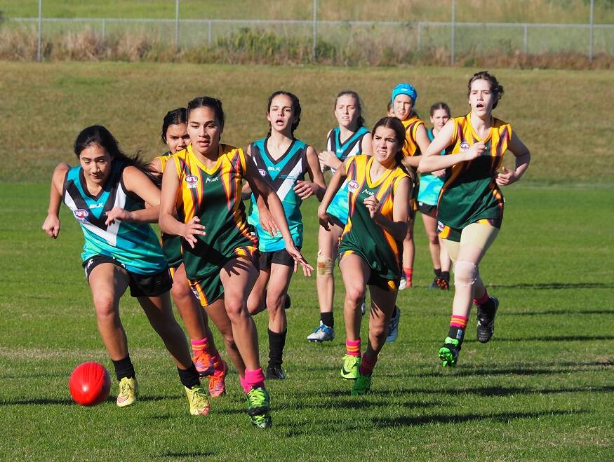 Ladies competing: Youth Girls Force taking on the Central Coast representative side. Photo: Supplied.
