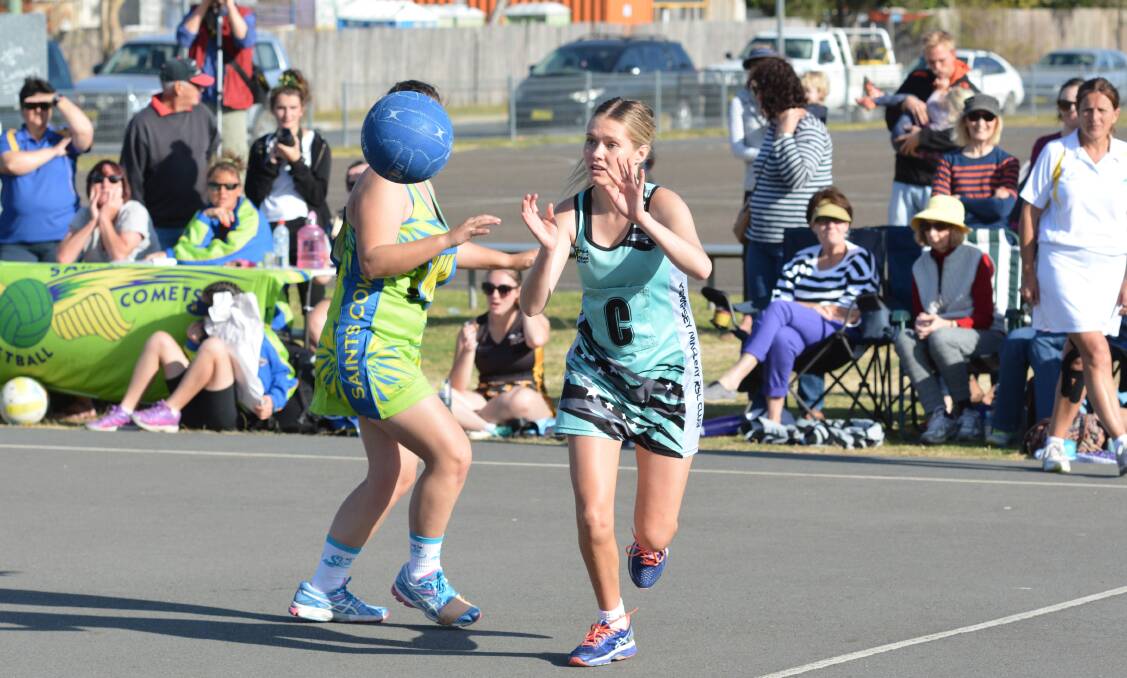 A competitor catches the ball in the division one grand final. Photo: Penny Tamblyn.