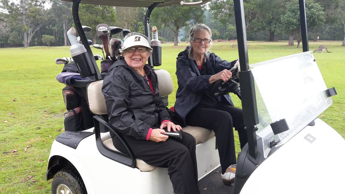 Enjoyment: Bev Kay (left) and Noelene Sheridan (right) have fun during their round of golf at Kempsey Golf Club. Photo: Supplied.