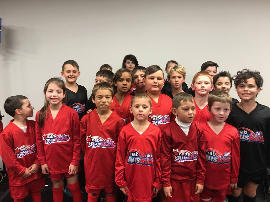 Playing in front of thousands: The Macleay Valley Eagles had 18 Auskick players take the field at half-time of the Swans vs Suns AFL match. Photo: Supplied.