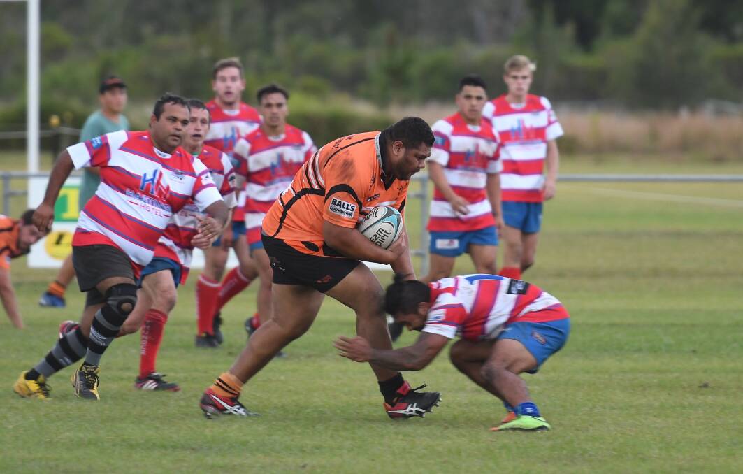 Charge: Kempsey Cannonballs first grade player Tasi Afoa charges at the Wauchope Thunder defensive line. Photo: Penny Tamblyn.