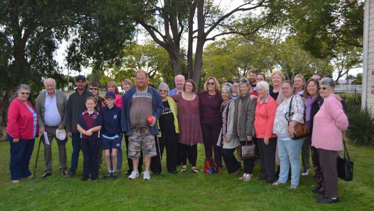 Fondly remembered: Family and friends at a memorial tree planting ceremony for Kay Clarke on Friday June 16. Photo: Callum McGregor. 