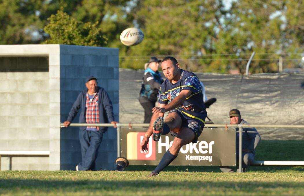 Conversion: Dennis Ritchie converts against the Port Macquarie Sharks. Photo: Penny Tamblyn.