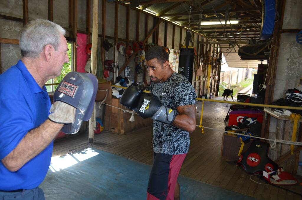 IBO Super Middleweight Champion Renold Quinlan prepares for his title defence in trainer George Ptolemy's backyard shed in Kempsey. Photo: Callum McGregor.