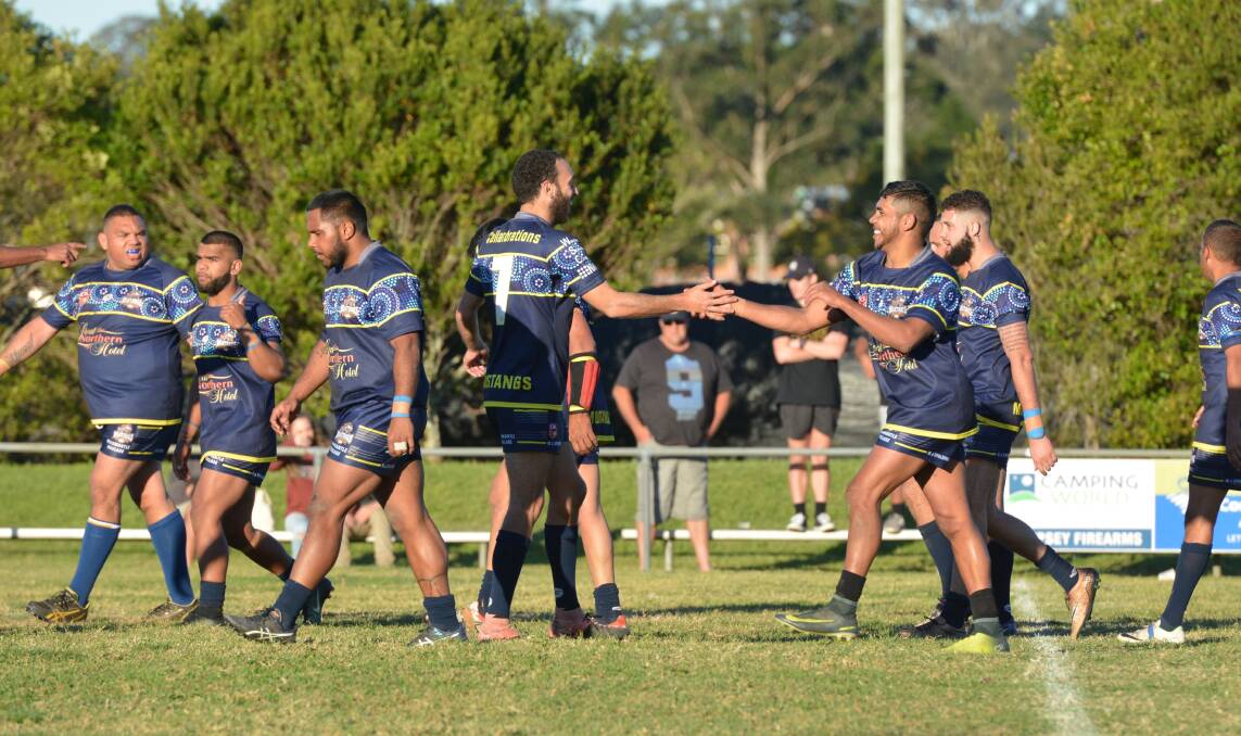 Celebration: The Macleay Valley Mustangs celebrate after scoring a try in the first half against the Port Macquarie Sharks. Photo: Penny Tamblyn.