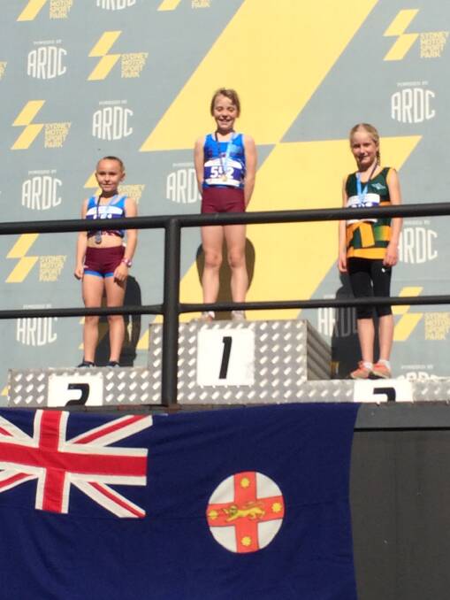 Cleo Schubert on the podium after claiming her bronze medal.