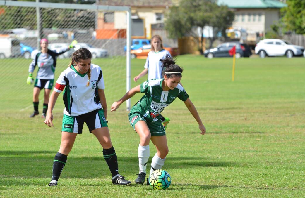 Smart move: Kempsey Saints Green team coach Amy O'Brien controls the ball at her feet in a match earlier in the season. Photo: Penny Tamblyn.