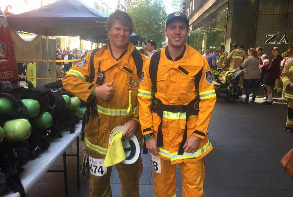 Christian Webster and Chris Coleman representing Dondingalong Rural Fire Service Association at the Centrepoint Tower climb on the weekend to raise awareness for Motor Neurone Disease.