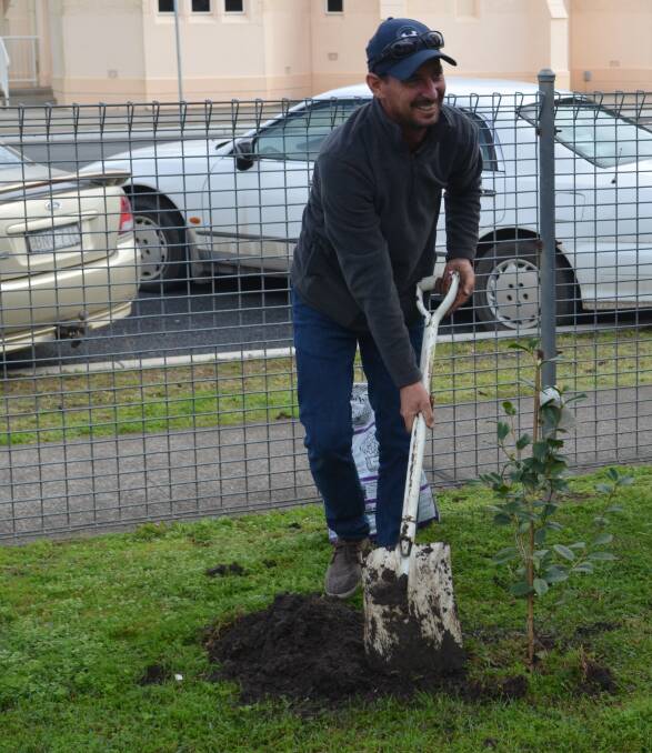 Kay's son plants a tree in his mother's honour.