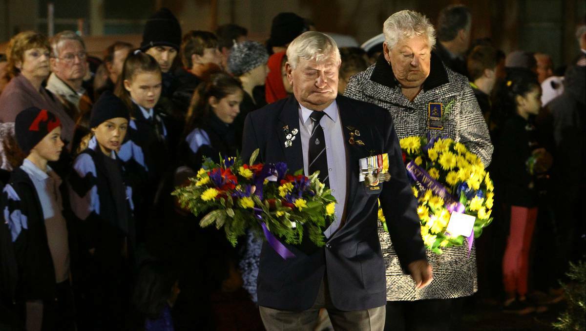 Thousands paid tribute to the Anzacs at the Wollongong dawn service. Photo: KEN ROBERTSON