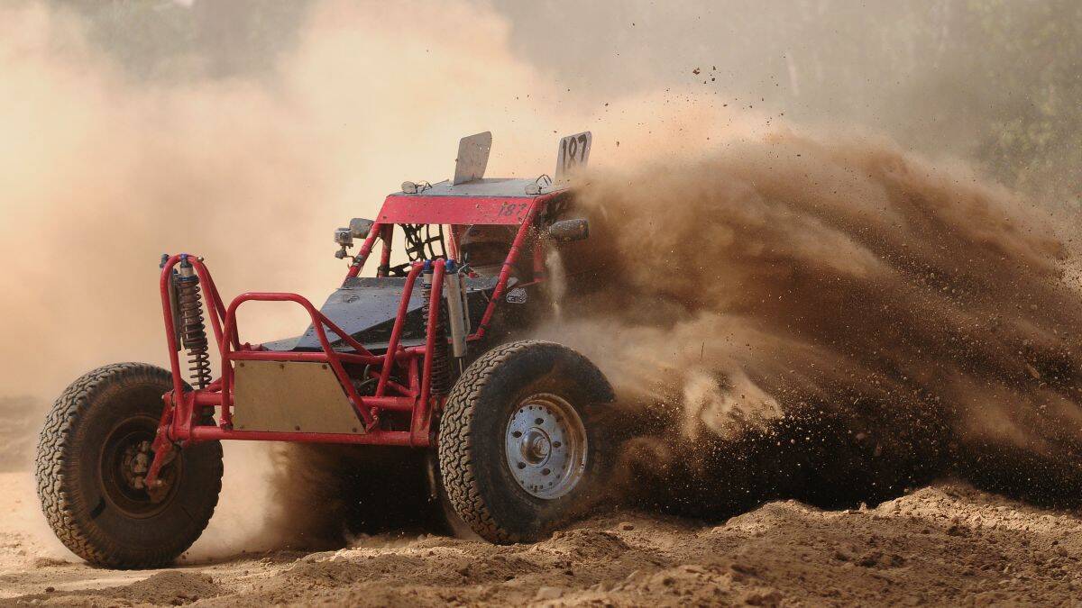 Another one fights the dust: Kempsey club member Craig Anderson in spectacular action at Dondingalong. PIC: SEAN O'LEARY