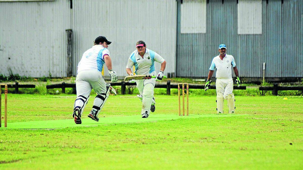 Great form: Todd and Blake Giddy take a quick single during the match against South West Rocks on Saturday. The brothers both scored half centuries, with Todd scoring 85 runs and Blake 56.
