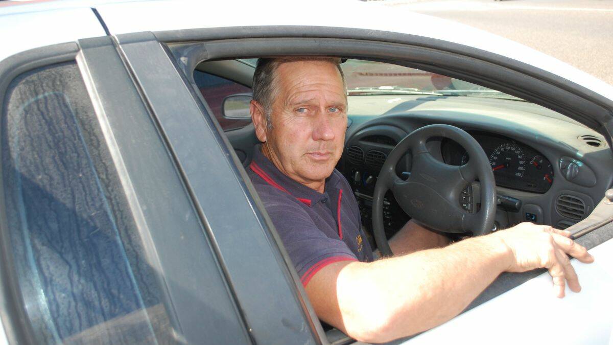 Hopeful: Four Aces Drag Racing Club president Kevin Unger - pictured at the wheel of his everyday ute - says the development application for a one-off event at the Kempsey airport has addressed all criteria.