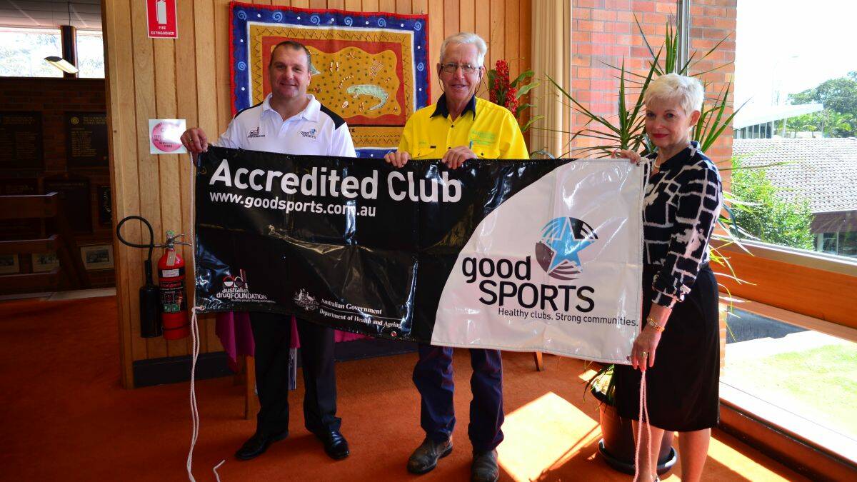 Alcohol under control: Marc Glanville, Mike Spalding and Kempsey Shire mayor Liz Campbell unveil the Mustangs Good Sports program accreditation banner at the council chambers yesterday.