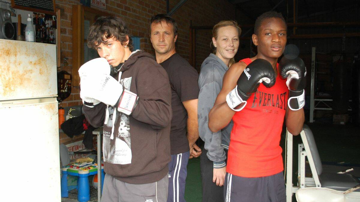 ❑ Ready to rumble: Hudson’s Gym trainers Kristen Perrin and Natasha Chapman, with up-and-coming youngsters Jacob Battle and Solomon McElroy.