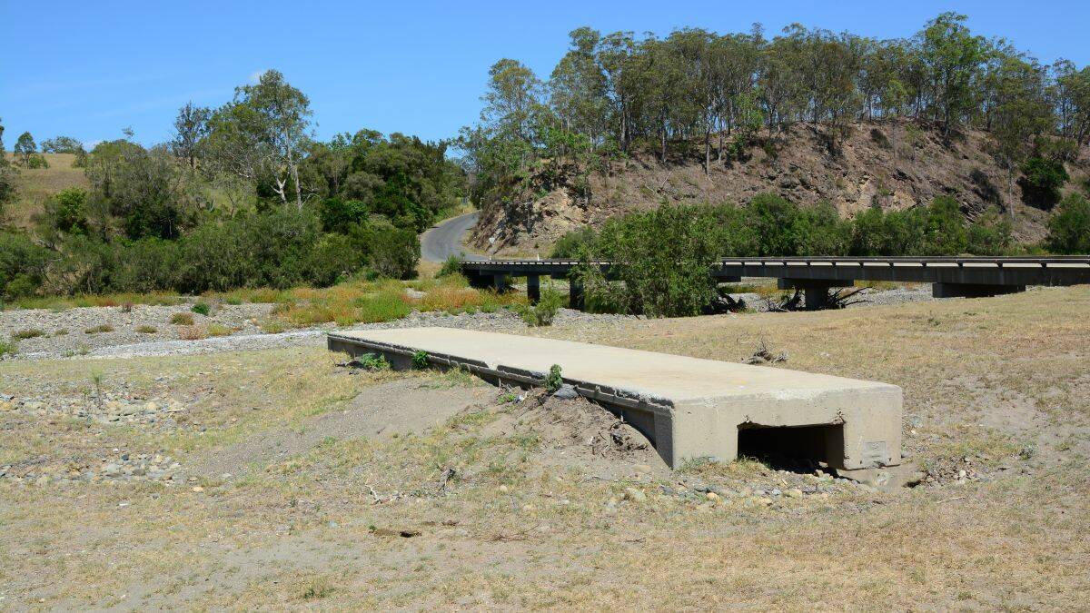 Too dry: this concrete section was washed away from the Toorooka bridge during one of the floods early last year