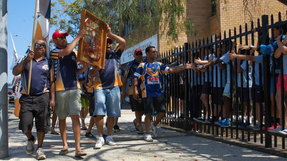 When the 'Stangs go marchin' in: Kempsey celebrates its the return of the first grade rugby league premier trophy's return after 50 years.