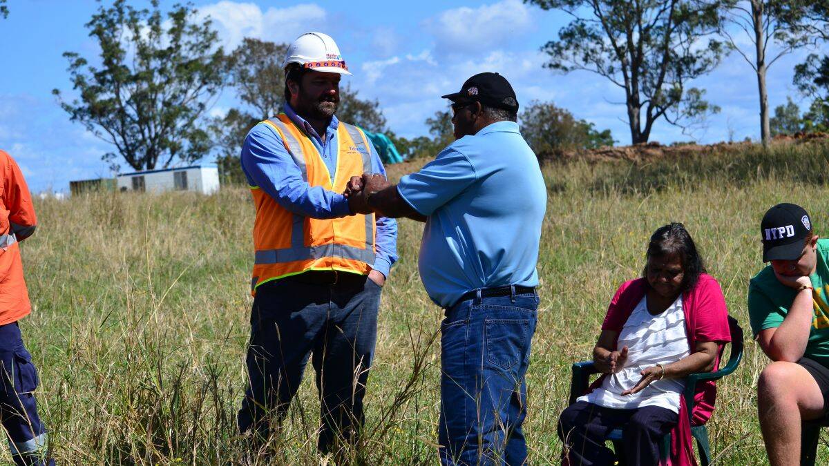 Spirit of cooperation: Dunghutti elder Grahame Quinlan greets Boyd Knights, Thiess project director for the Frederickton to Eungai upgrade.