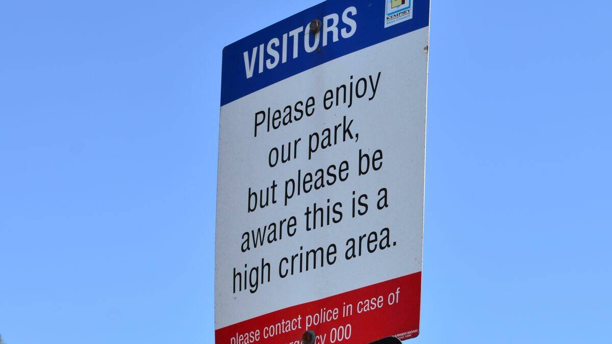 Sign of the times: signs at the South Kempsey Tourist Park warn visitors that it is a high crime area.