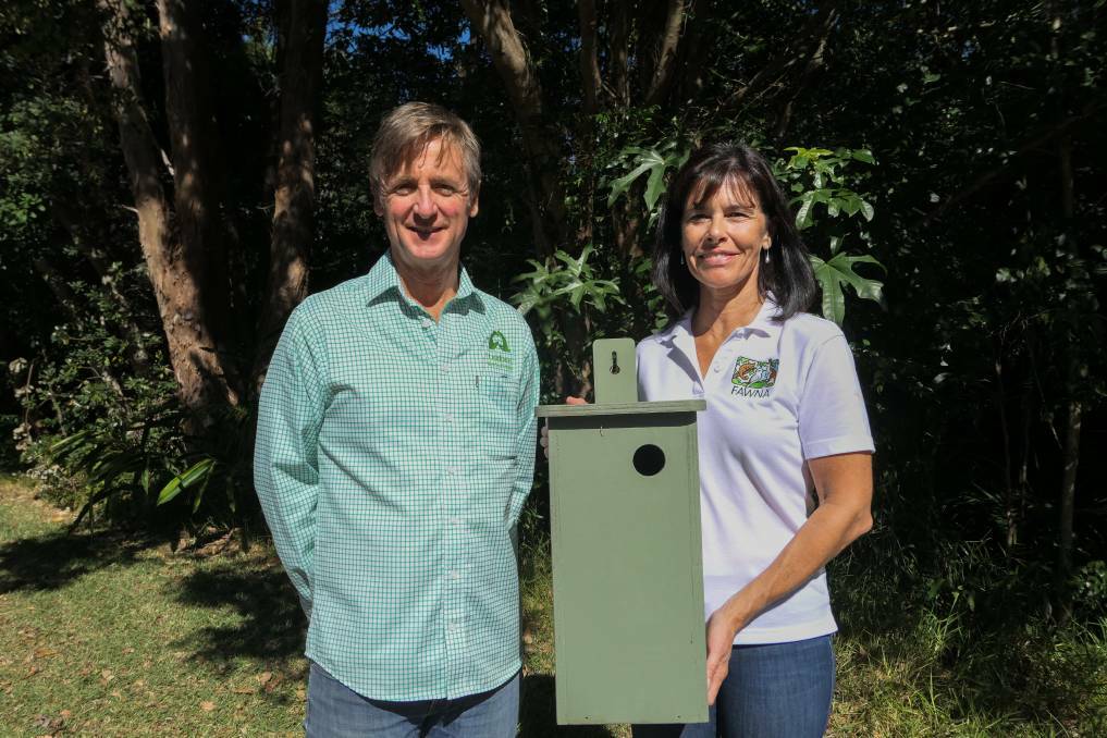 Landcare Officer Andy Vinter and FAWNA spokesperson Louise Moore with a nest box. Photo: Supplied
