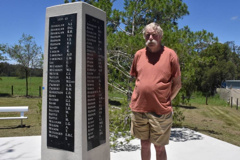 Terry Flynn standing next to the new memorial, the tree from Lone Pine is behind him. Photo: Sam Payne
