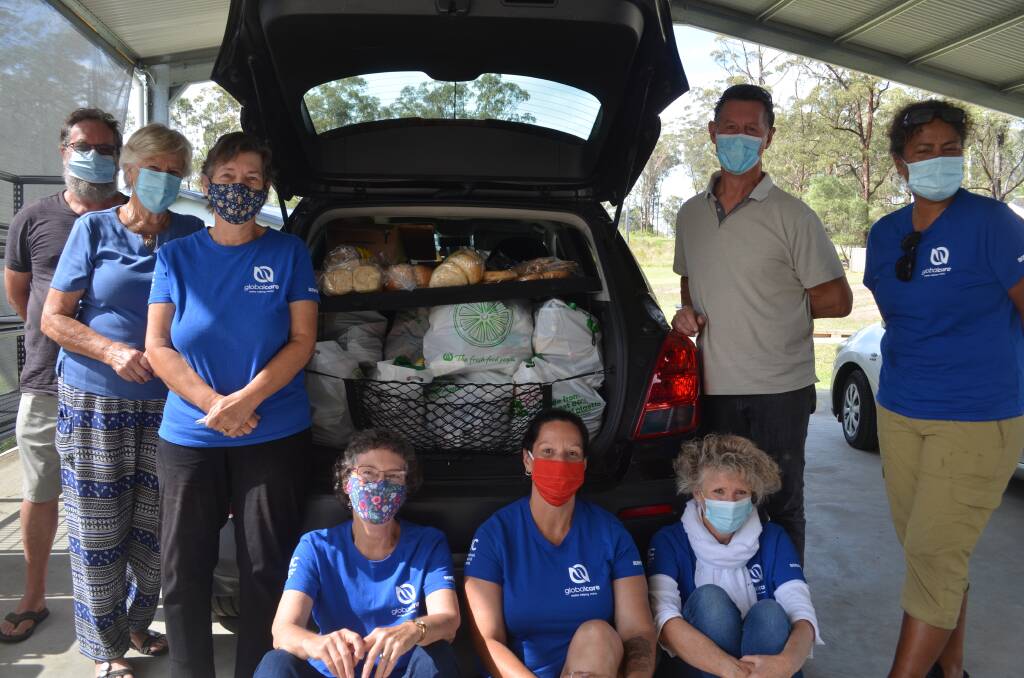 The iCare team before a delivery run. Photo taken by Sam Payne 