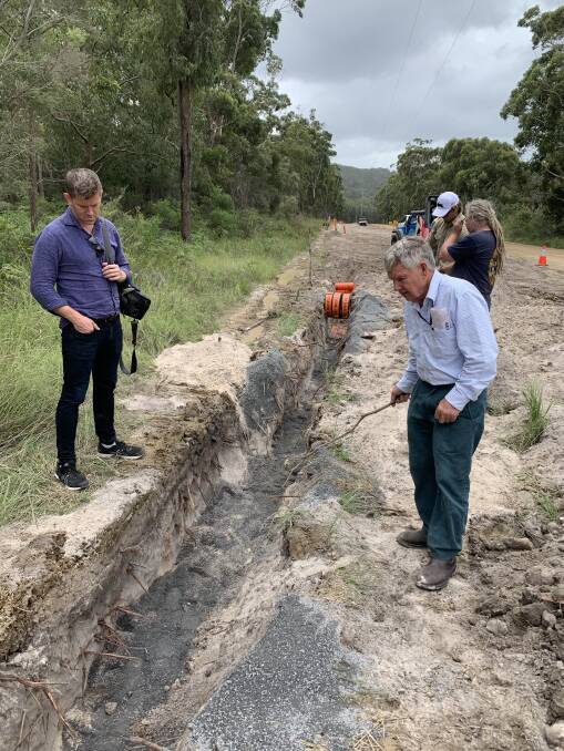 Dr Richard Martin UQ anthropologist and Dunghutti elder Uncle Reg Woodeson assessing a trench excavated by KSC contractors in April this year. Photo: Supplied