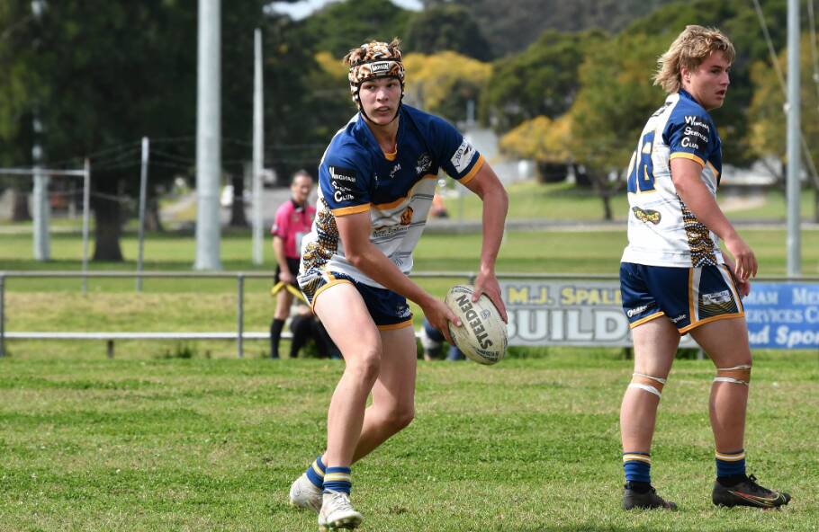 Cooper Petterson looks to pass the ball in the under-18's game against Wauchope Blues in 2022. Picture by Penny Tamblyn