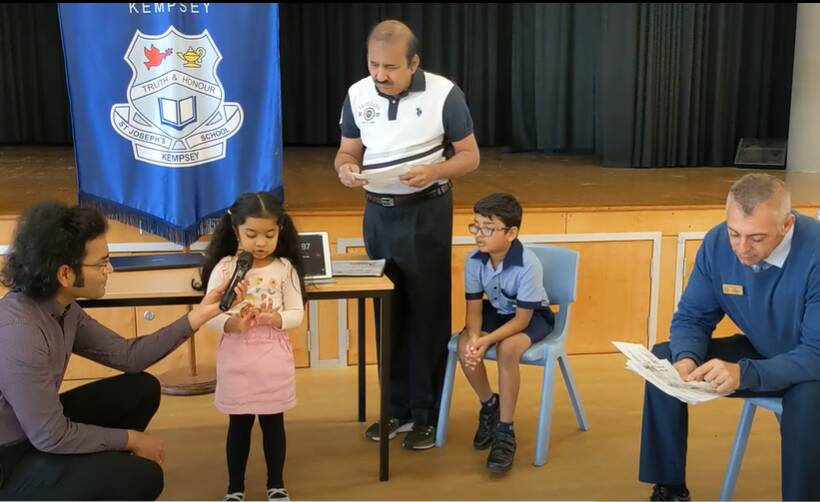 Mihira, aged four, identifying all the bones in the human body in just one minute and two seconds while her grandfather Dr V.V.L.N. Sarma and brother Mayukh look on. Picture: supplied