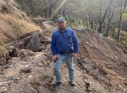 Farmer Newman Hollis at the site of the Toose Road landslip. Photo: supplied