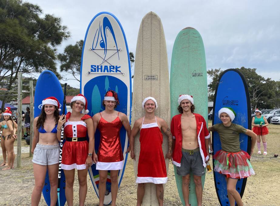 Hundreds gather for the Crescent Head Santa Surf Christmas Eve tradition.