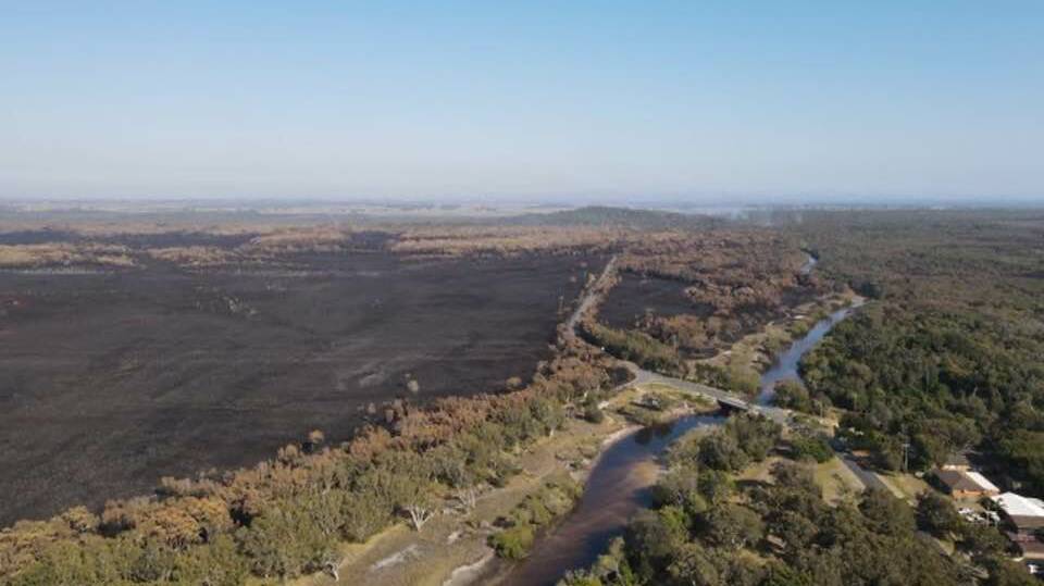 Aerial photo of burnt areas of Hat Head taken on Saturday, October 22. Picture by Michael Davidson 