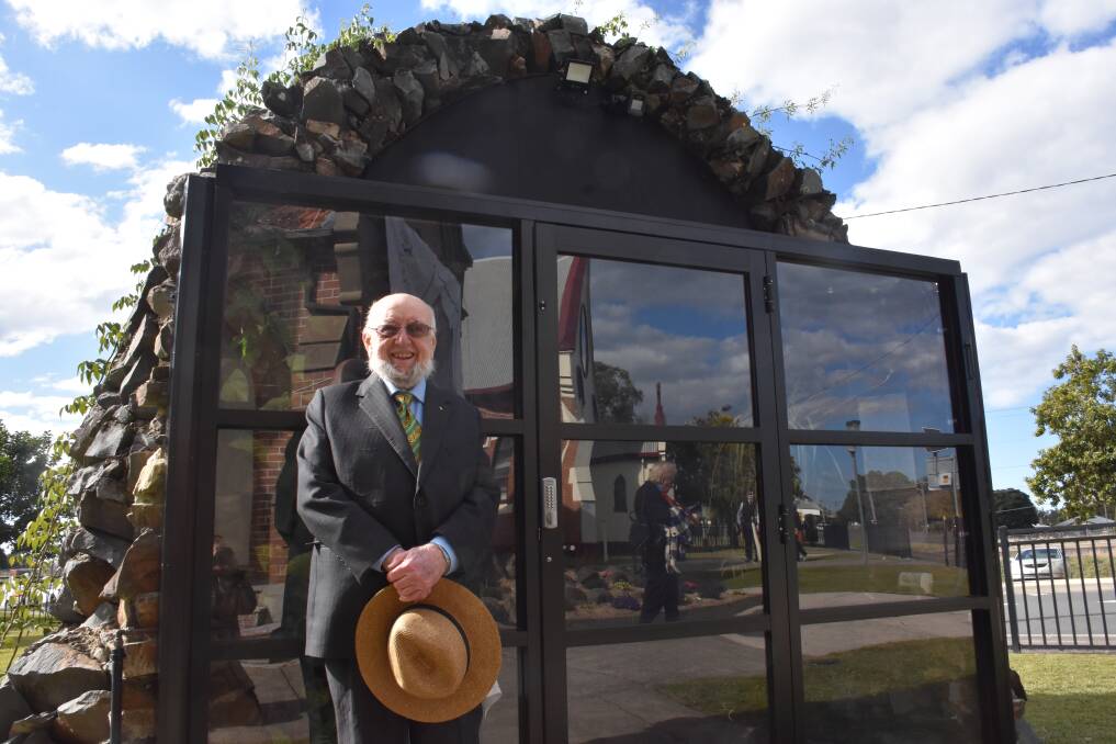 Thomas Keneally stands by the Lourdes Grotto that his grandfather originally helped build. Photo: Emily Walker