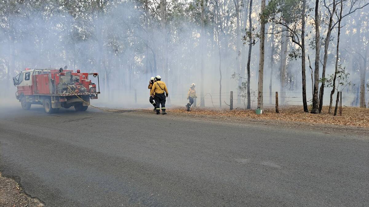 RFS crews attending to the Willi Willi fire on Wednesday, October 18. Picture by Fiona and Arthur Cristian