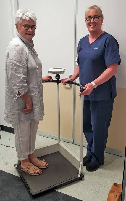 Lilli Pilli Ladies President Judy Saul and Acting Nurse Unit Manager Kristy Long with one of the two digital measuring stations donated to Mid North Coast Cancer Institute.
Picture provided by NSW Mid North Coast Health Local District