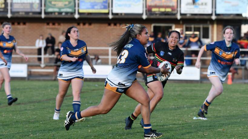 Macleay Valley Mustangs' Christa-Lee Smith charges forward in the North Coast Women's Rugby League grand final. Picture by Penny Tamblyn