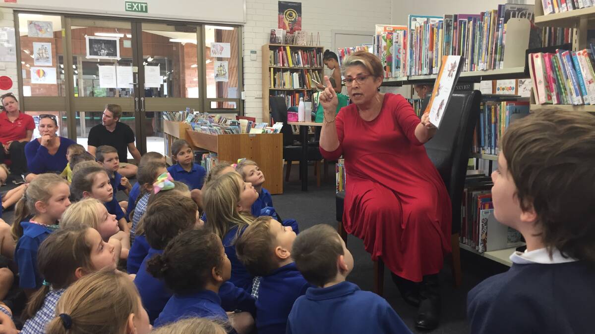 Cultural Achievement: Lissa Argue reading Hickory Dickory Dash at Macksville Library.