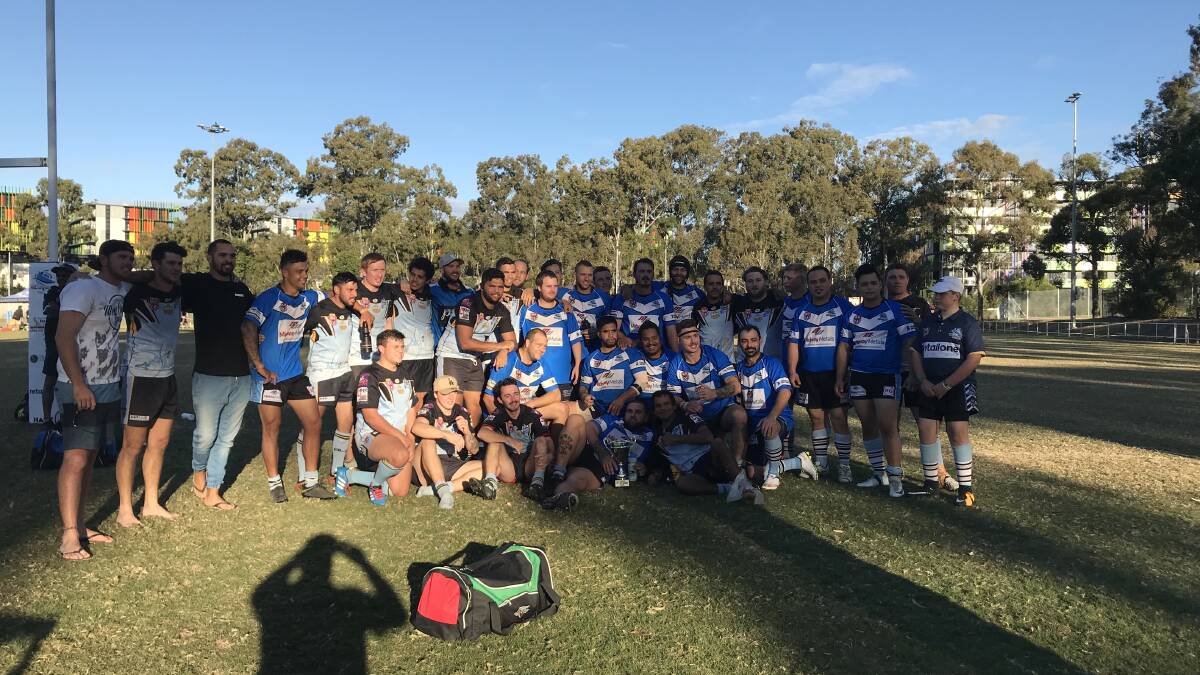 UNITED: The Beaudesert Kingfishers Debbie Marzella Cup team with the Parkwood side following the game. Photo: Supplied.