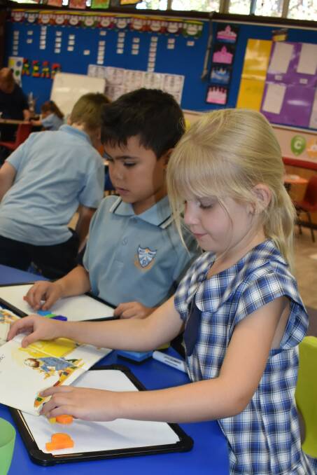 West Kempsey kindergarten children enjoying a literacy lesson.