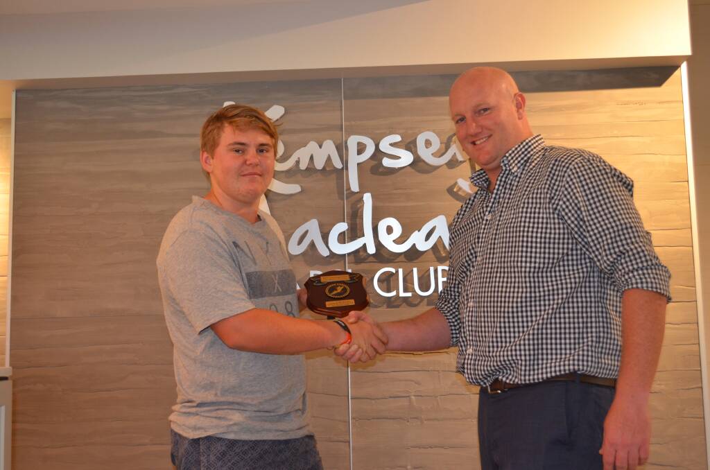 CONGRATULATIONS: Emerging lawn bowler Cody Griffin receives the Sportsperson of the Month award from Kempsey Macleay RSL CEO Daniel Abela.