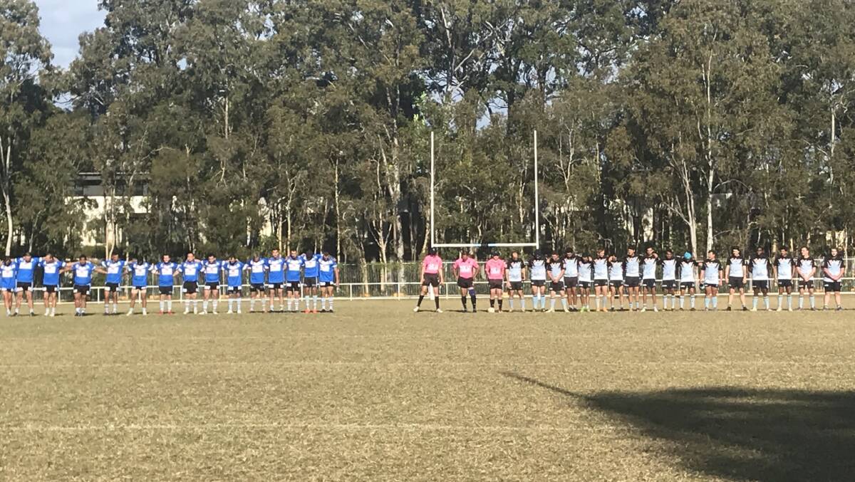 RESPECT: Beaudesert Kingfishers and Parkwood prior to kick-off. Photo: Supplied.